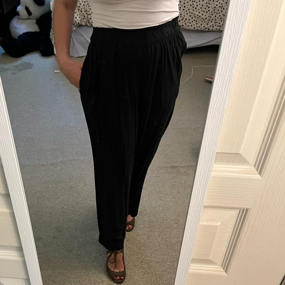 Black loose fit trousers with elastic band